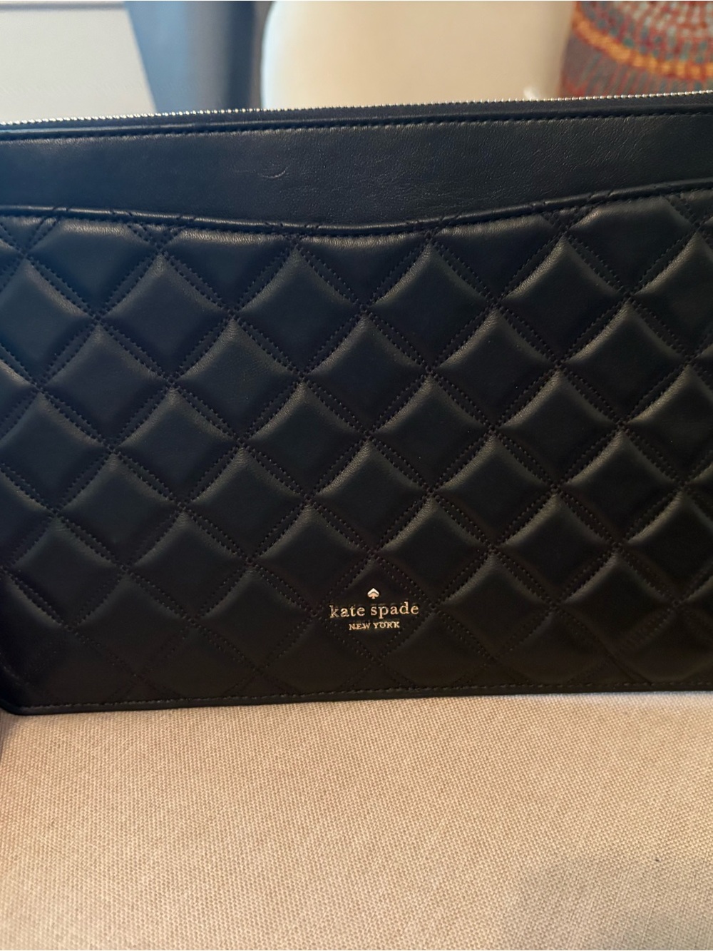 kate spade Black Quilted Leather Zip Pouch with Gold Logo